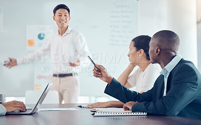 Buy stock photo Presentation, leadership and businessman in a meeting planning a marketing, branding and sales strategy. Asian ceo talking, communication and speaking on our vision, startup mission and innovation
