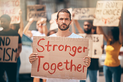 Buy stock photo Portrait, protest in street and group stand in solidarity, climate change and march together. Man, people and crowd support human rights, equality activism and blm movement for lgbtq, racism or earth