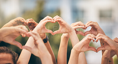 Buy stock photo Hand, heart and love with a group of people making a sign with their hands outdoor together in the day. Crowd, freedom and community with man and woman friends doing a gesture to promote health