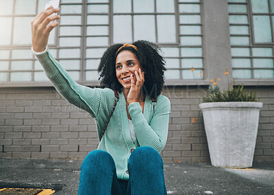 Buy stock photo Phone, happy and woman taking a selfie on a street sidewalk outdoors to post online for social media. Smile, student and young girl enjoys taking pictures alone and posting them on a social network 