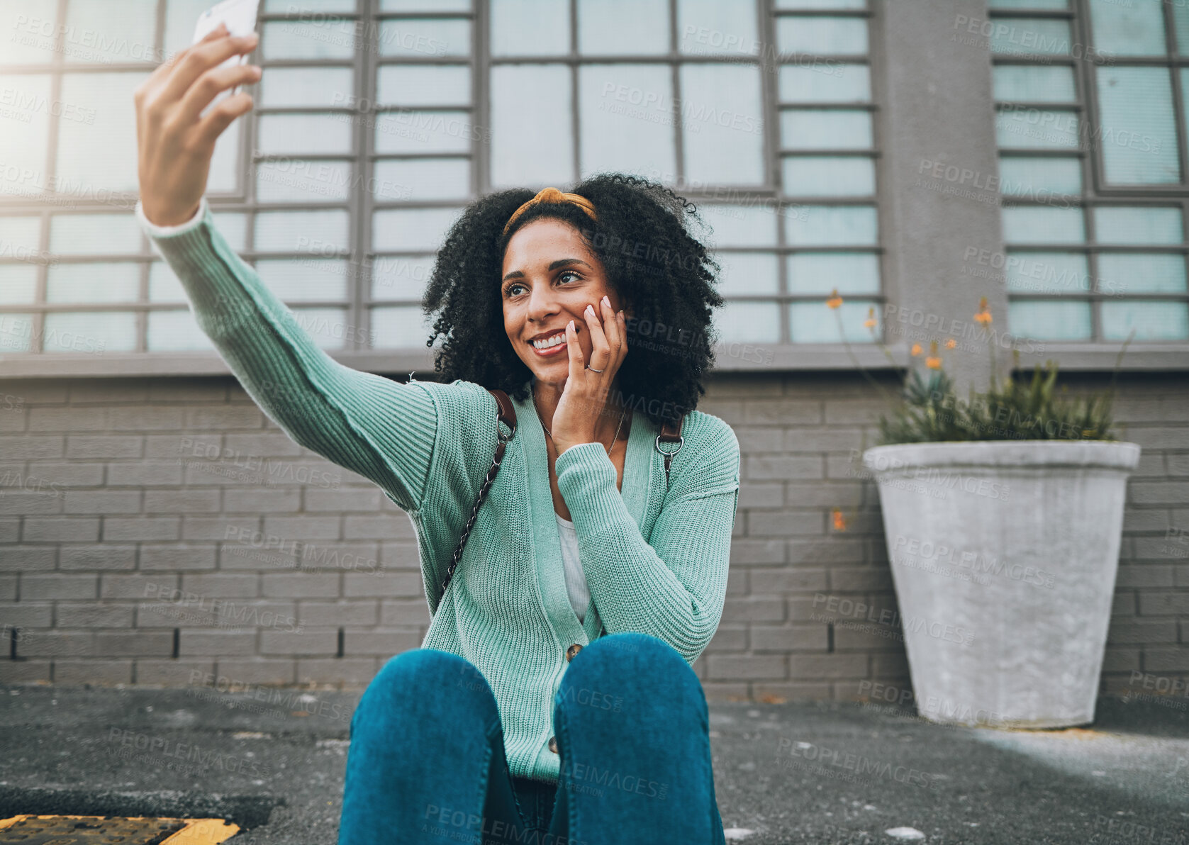 Buy stock photo Phone, happy and woman taking a selfie on a street sidewalk outdoors to post online for social media. Smile, student and young girl enjoys taking pictures alone and posting them on a social network 