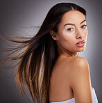 Beauty, skincare and portrait of woman with vitiligo standing in studio with health facial routine. Cosmetic, natural and face of girl model from Mexico with piebald skin isolated by gray background.