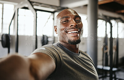 Buy stock photo Selfie, fitness and black man training, doing a workout and cardio in the gym. Young, portrait and African athlete sweating in a photo after exercise for health, body strength and sport at a club
