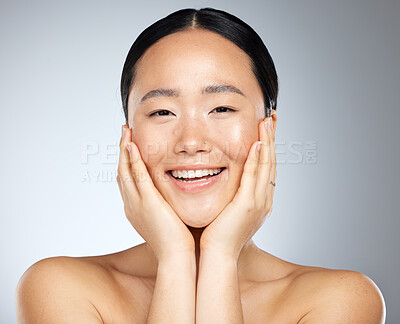 Buy stock photo Cosmetics, asian woman and facial care for natural beauty, wellness and smile being happy, studio background and healthy. Portrait, makeup and organic facial for skincare, health and relax body care.