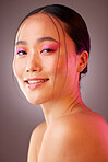 Futuristic makeup, neon and woman for asian beauty, cosmetics glow and creative product in studio light portrait. Skincare vaporwave and ai model from Korea in headshot smile for dermatology mock up