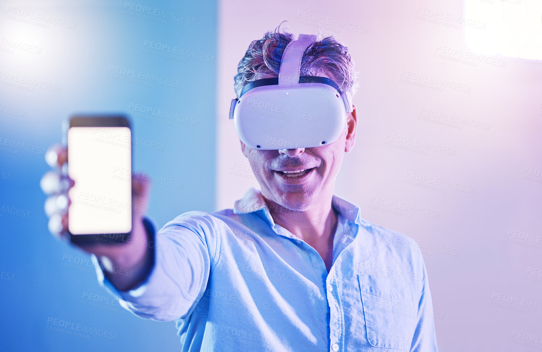 Buy stock photo Elderly man with virtual reality, social media app on smartphone screen mockup and metaverse ux. Advertising communication technology, hand holding digital cellphone in neon studio and mobile startup