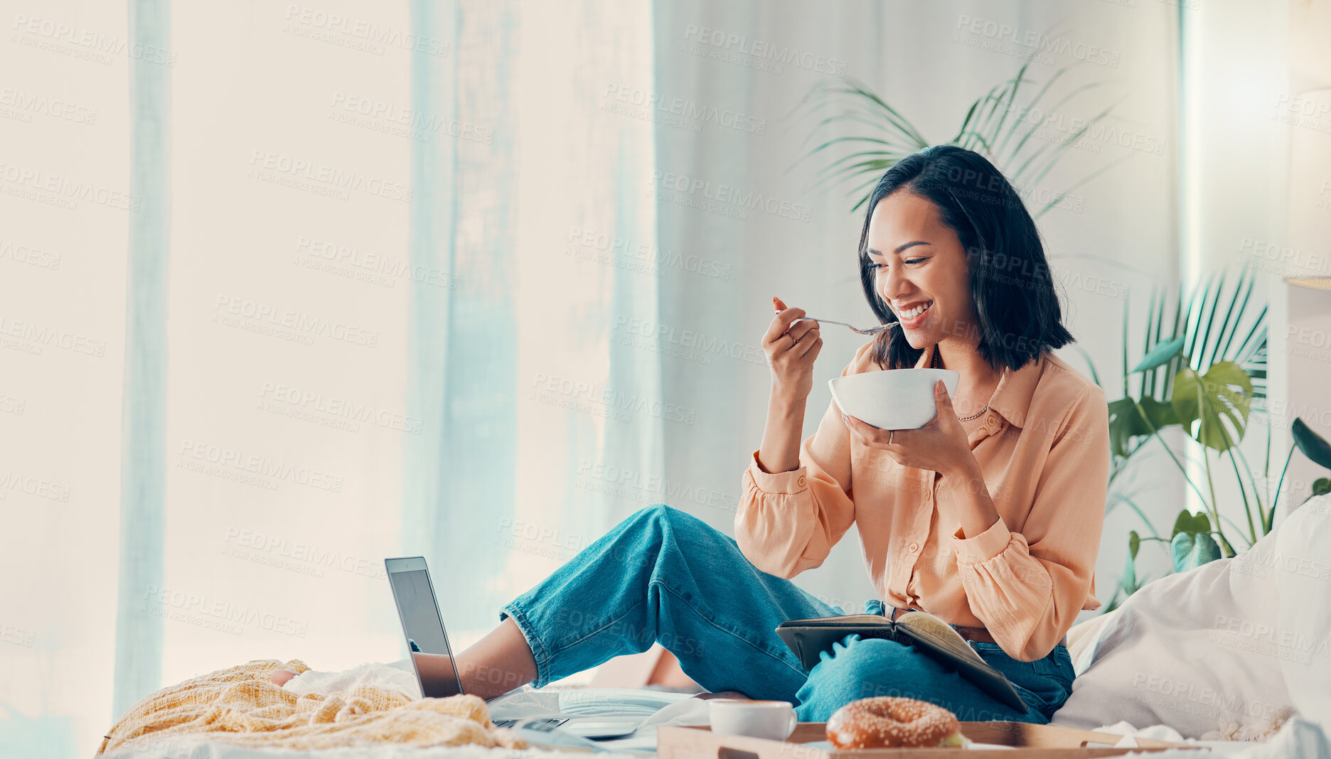 Buy stock photo Breakfast, laptop and woman streaming a movie for lunch or brunch in a relaxing hotel suite bedroom on holiday. Smile and happy person enjoys laughing at comic shows or comedy films and eating food