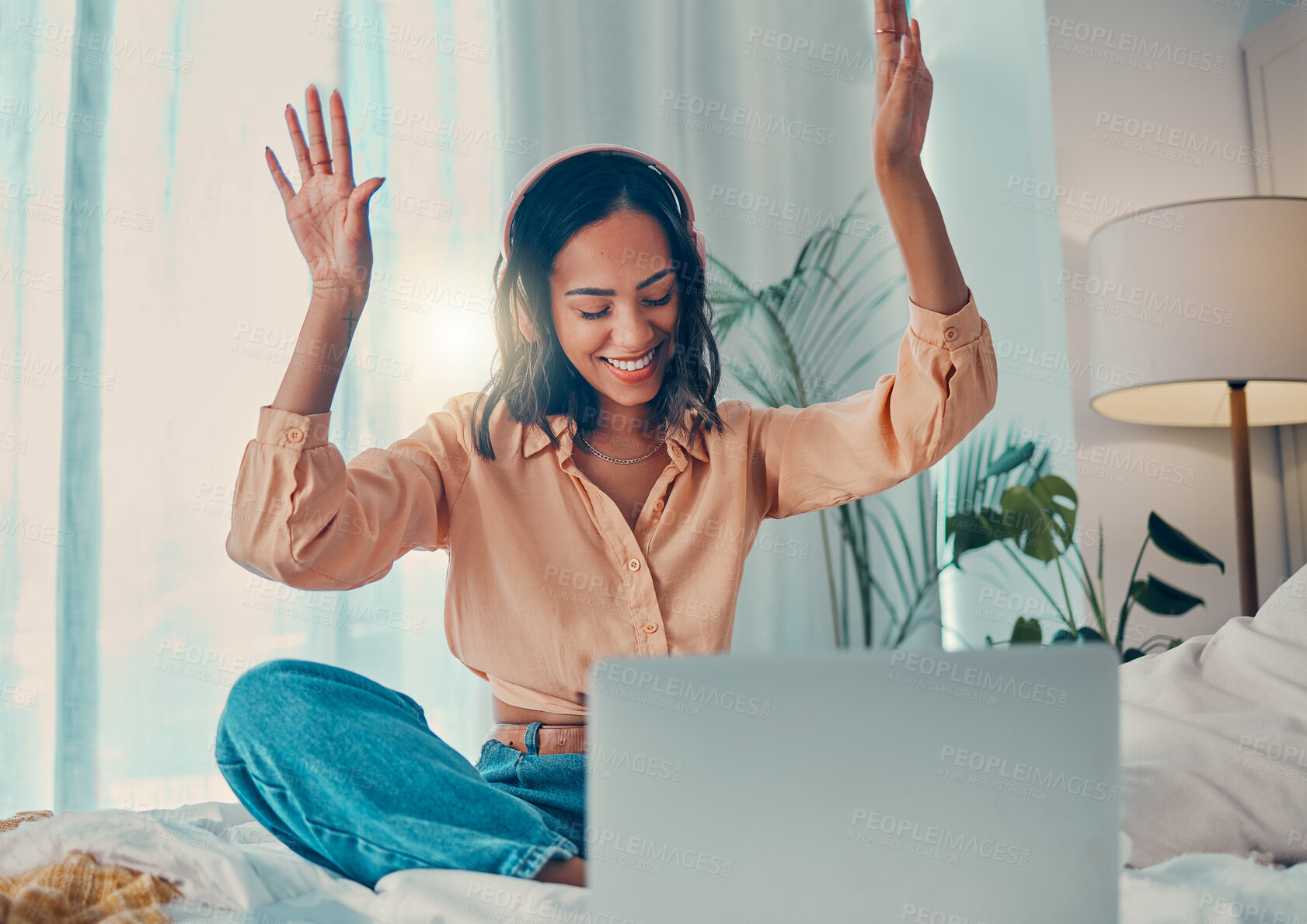 Buy stock photo Happy woman, laptop and listening to music using headphones, internet and dancing sitting in bedroom apartment for fun. Female, energy dance and streaming online with wifi technology to relax at home