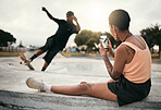 Man on skateboard in park, woman photograph skater boyfriend in city on smartphone or urban lifestyle in Los Angeles. Street fashion culture, young edgy couple streaming video online or social media