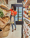 Supermarket, black woman and grocery shopping for fruit, vegetables and healthy produce at a local store. Happy, relax and customer choosing organic, vegetarian and vegan items for salad or diet