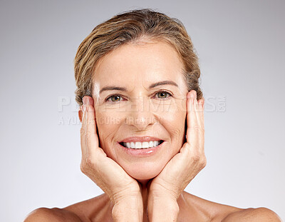 Buy stock photo Senior woman, beauty and touch face, skincare and smile for aesthetic results, facial glow or natural cosmetics on studio background. Portrait of happy, healthy and mature model self care wellness 