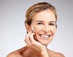 Beauty, skincare and portrait of happy mature woman with smile on face, skin glow and anti aging makeup. Health, wellness and senior lady enjoying healthy lifestyle, self love and body positivity.