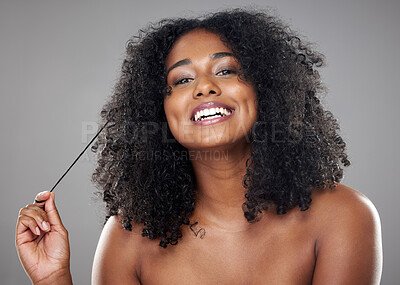 Buy stock photo Beauty, hair and black woman in a studio with mockup for wellness, skincare and health while grooming against grey background. Portrait, model and cosmetic, hair care and clear skin, relax aesthetic 