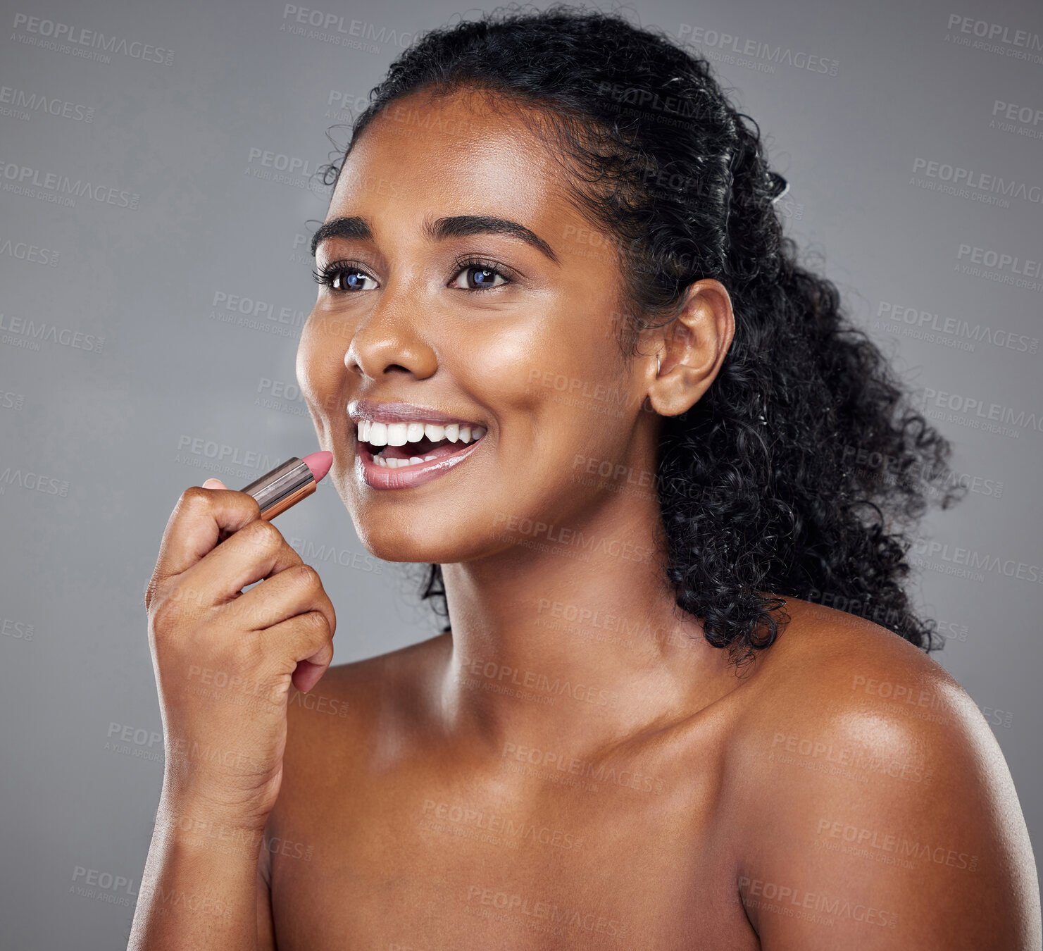 Buy stock photo Lipstick, woman and lip cosmetics, makeup and smile in a mockup grey studio background. Beauty girl model happy with health, wellness and skincare with healthy, glowing and smooth skin results