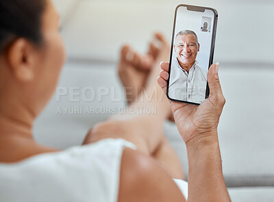 Buy stock photo Phone, video call and senior couple talking, communication or discussion in home. Digital tech, mobile and female relax on sofa on 5g smartphone app, video conference or online video chat in house