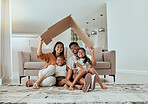 Family, care and home insurance portrait with parents protecting their house and children. Cardboard, covering and safety with parents keeping with kids safe. Love, mortgage and family house cover