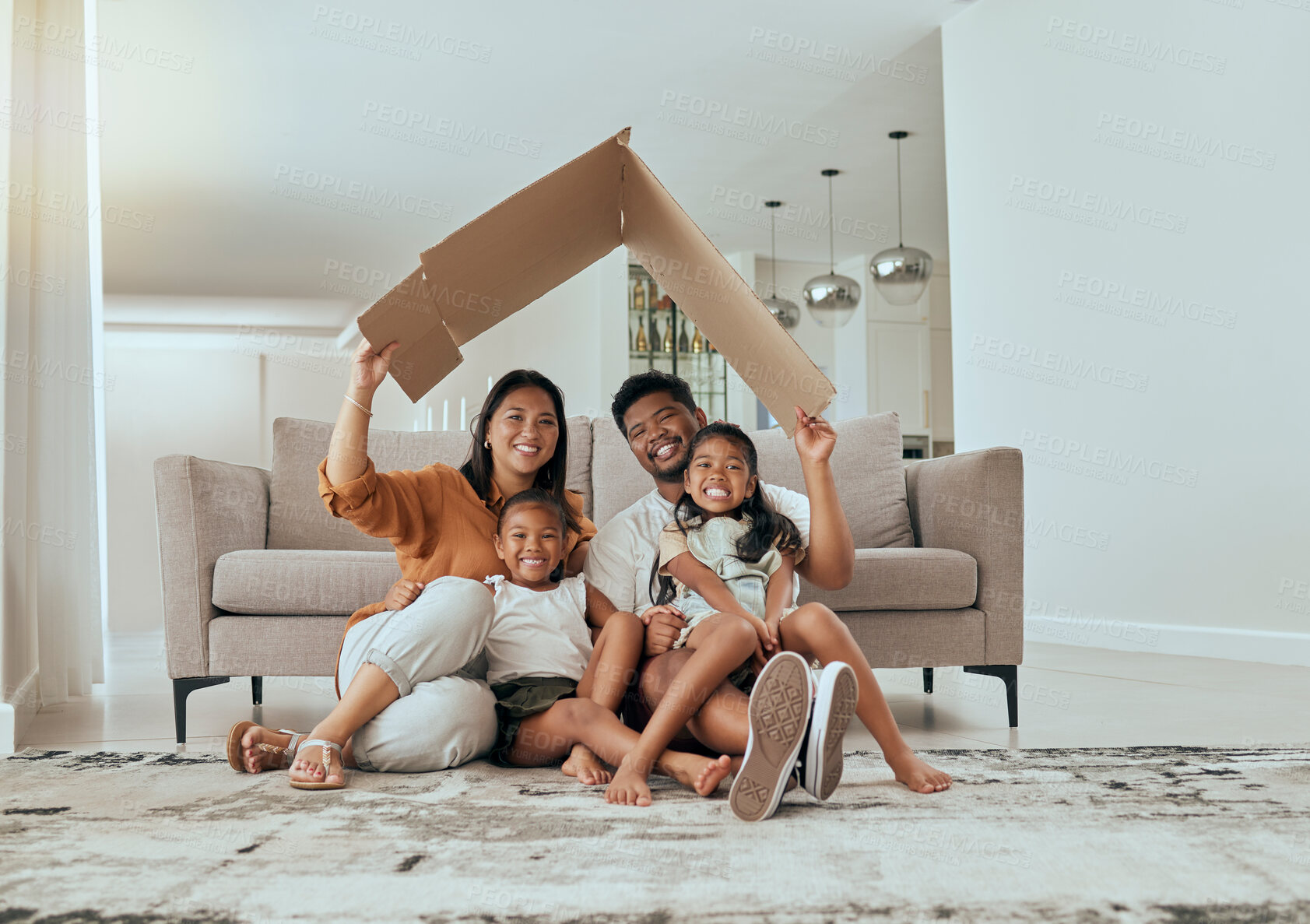 Buy stock photo Family, care and home insurance roof portrait with parents protecting house and children. Cardboard, covering and safety with parents keeping with kids safe. Love, mortgage and family house cover