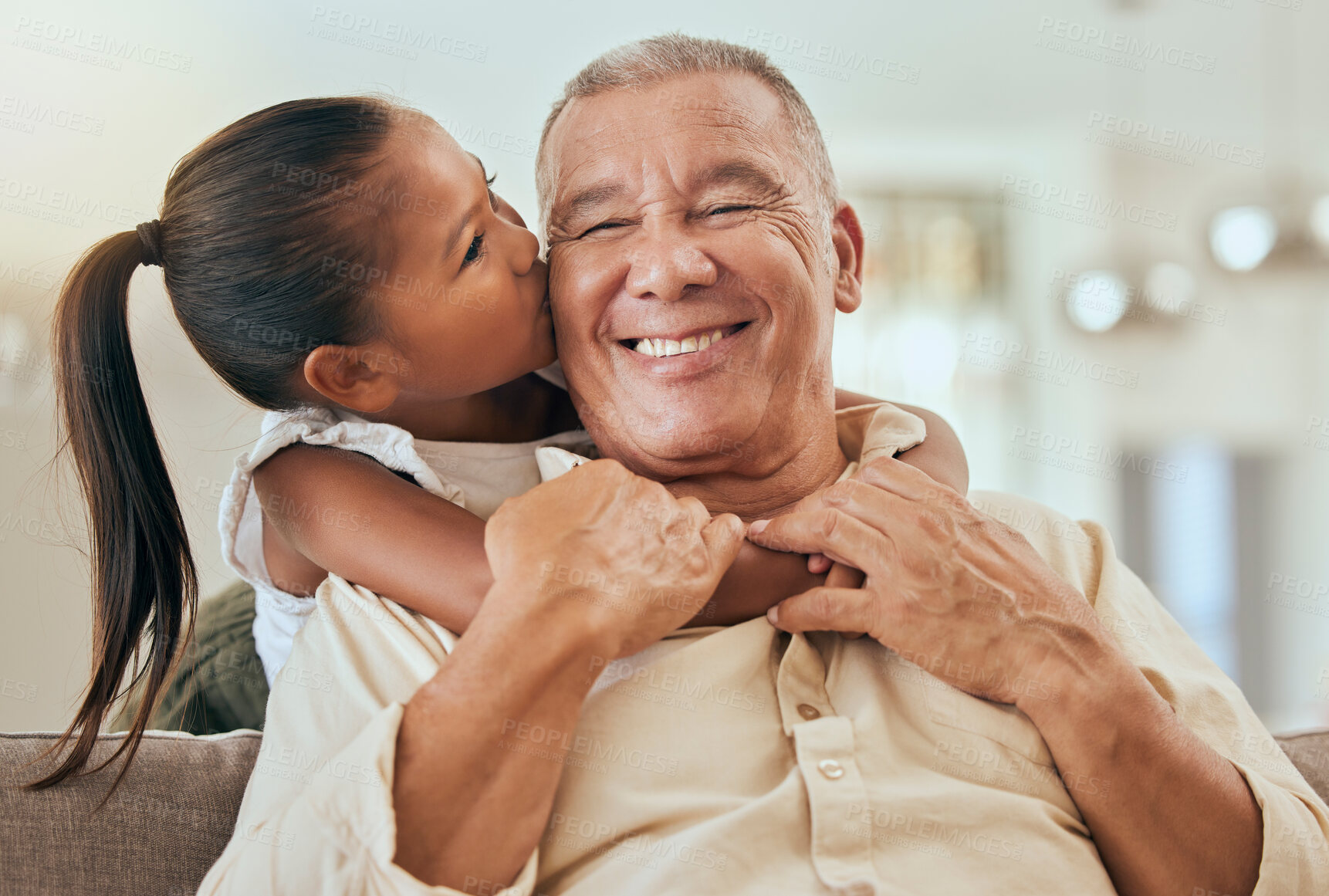 Buy stock photo Happy, grandfather and little girl kiss with hug for love and care in family bonding time or generations at home. Portrait of grandpa with smile in happiness for hugging, loving and caring grandchild