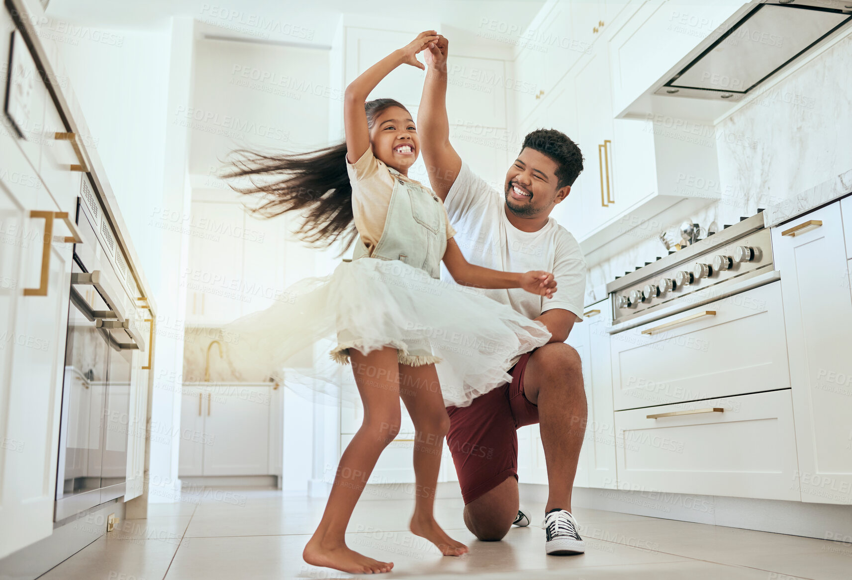 Buy stock photo Love, dancing and father with girl in kitchen bonding, having fun and playing together. Family, affection and happiness in Indian dad with child dance, spin and relax in family home enjoying weekend