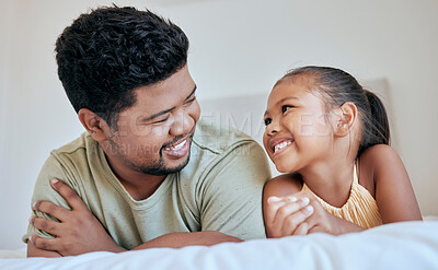 Buy stock photo Father, child and family, together on bed and happy at family home, bonding and smile, spending quality time in bedroom. Filipino, man and girl, love and care, childhood and parenthood at the house.