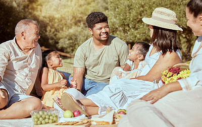 Buy stock photo Black family, picnic with food in a nature park in summer happy about quality time together. Happiness of parents, children and elderly people with a smile, love and care outdoor in the sun with kids