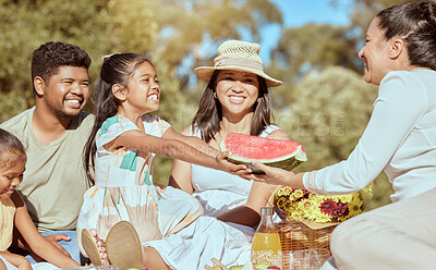 Buy stock photo Picnic, watermelon and happy family in park with summer fruits for wellness, outdoor holiday and health with children and parents. Excited Mexico people eating healthy food in green park and sunshine