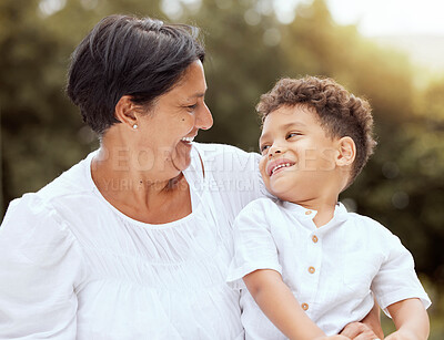 Buy stock photo Family, relax and grandmother bond with grandchild at a park, happy and smiling in nature together. Love, happy family and elderly woman enjoying time with little boy in forest, laughing and talking