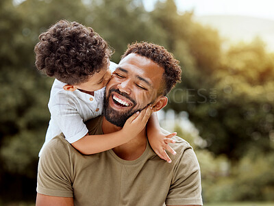 Buy stock photo Father, bonding kiss and boy child hug happy in nature with quality time together outdoor. Happiness, laughing and family love of a dad and kid in a park enjoying nature hugging with care and a smile