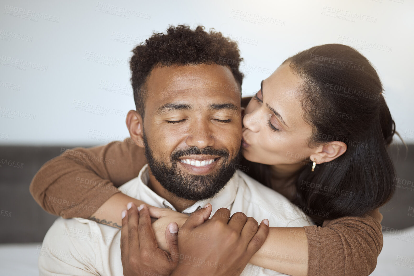 Buy stock photo Love, black couple and kiss with hug, being happy and embrace together for marriage, anniversary and bonding. Romance, man and woman being loving, enjoy relationship and being romantic and happiness.