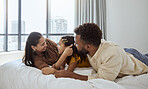 Happy family, relax and girl in bed with mother and father, bond and resting in their home together. Love, black family and child enjoy lazy morning indoors with parents, rest and embrace in bedroom
