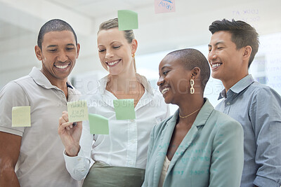 Buy stock photo Teamwork, planning and strategy with sticky notes on glass in an office and a business team working together. Meeting, schedule and collaboration with a female leader and employee group in a workshop