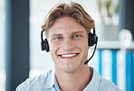 Call center, ecommerce and worker working, consulting and giving support to people online at telemarketing company. Face portrait of young, happy and customer service employee with smile for service