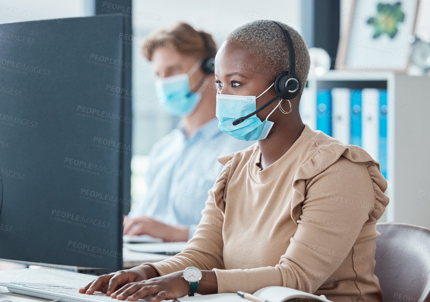 Buy stock photo Black woman, call center and face mask for covid, headphones and phone call with client, customer service or telemarketing sales job. Contact us, consultant and tech support, health safety at work.