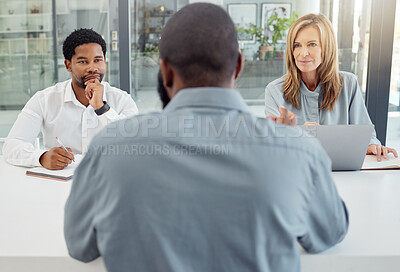 Buy stock photo Interview, recruitment or hiring with hr team in meeting with job seeker, professional or unemployed man in company office. Business people listen to question, negotiation or answer of person for job