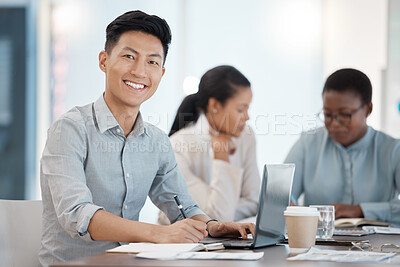Buy stock photo Coworking, smile and businessman working on a laptop, planning in a notebook and writing an idea at work. Portrait of an Asian, corporate and marketing worker with research and information on the web