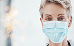 Face mask, covid compliance and woman doctor in a hospital for health, safety and wellness with healthcare insurance. Portrait of female medical worker during covid19 pandemic in clean hospital
