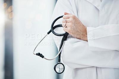 Buy stock photo Senior doctor, hands and stethoscope in hospital ready for diagnosis, check up or heart health closeup. Healthcare, expert or cardiologist holding equipment for cardiology exam in doctors office.

