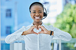 Hands, heart and call center consultant in city with black woman happy, smile and excited about customer service excellence. Black woman, hands and love sign by advisor passionate about crm business
