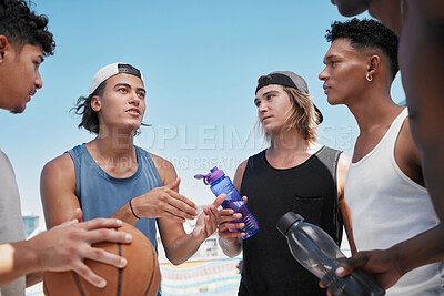 Buy stock photo Basketball, team and collaboration for game strategy, planning or sports discussion in the outdoors. Group of athletic sport players in social conversation for teamwork, cooperation and match plan