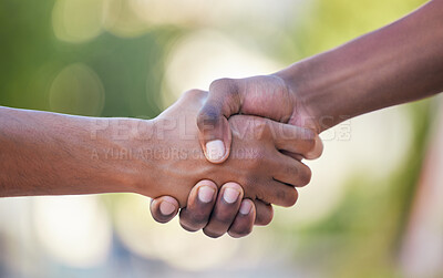 Buy stock photo Hands, handshake and friendship in trust, support or care for relationship, agreement or unity against bokeh background. Hand of people shaking for community, collaboration or partnership deal