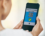 Hand phone, vaccine qr code and covid app on screen with registration for medical passport, barcode for work security or healthcare safety. Woman with travel digital vaccination certificate on mobile