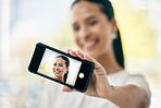 Phone, selfie and screen with a woman taking a photograph on her smartphone for social media. Face, portrait and headshot with a female posing for a picture using wireless mobile technology alone