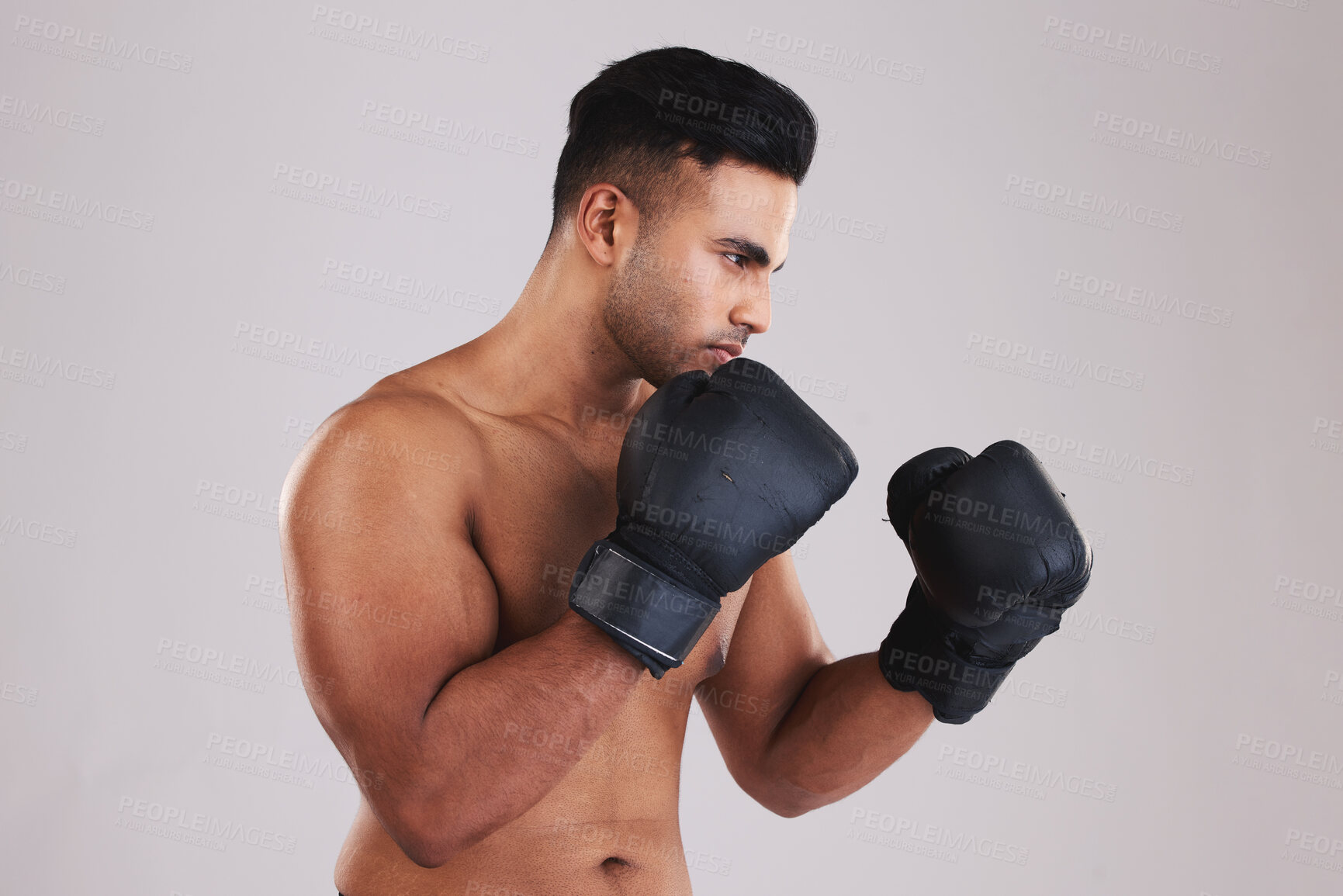Buy stock photo Fitness, boxing gloves and sports man ready for exercise, training and workout in studio for health, wellness and sport. Male motivation to box, fight and hit for energy, competition and inspiration