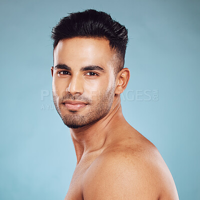 Buy stock photo Health skincare and a portrait of man, topless with healthy skin and natural glow after detox facial and smile on face in India. Male body care, fitness and self love in studio with blue background.