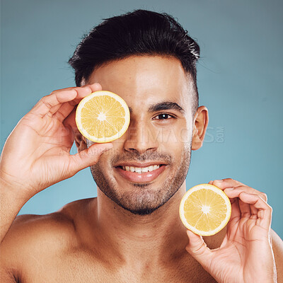 Buy stock photo Skincare in nature, beauty and man with lemon for vitamin c facial detox for healthcare, natural and healthy skin glow. Fruit, wellness and sustainability, luxury eco cleaning and grooming product.