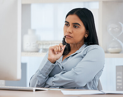 Buy stock photo Computer, thinking and idea with a business woman at work alone at a desk in an office alone. Internet, email and planning with a female employee working with a mindset of problem solving or strategy
