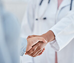 Handshake, trust and thank you with patient and doctor or medical worker shaking hands, greeting or introduction during consultation. People hand welcome gesture or welcome, partnership or help
