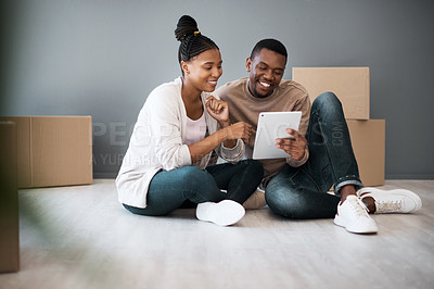 Buy stock photo Tablet, box and moving with black couple in new house for planning, real estate and property. Investment, goals and future with man and woman in new home with technology, internet and growth