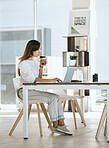 Laptop, coffee and business woman in office drinking espresso or cappuccino. Computer, tea and female from Canada with hot beverage while typing report, research or reading email in company workplace