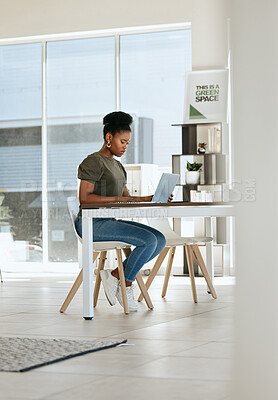 Buy stock photo Black woman, laptop and working in home office for startup business entrepreneur, work from home expert or remote research manager. African girl, typing email or seo employee on computer at home